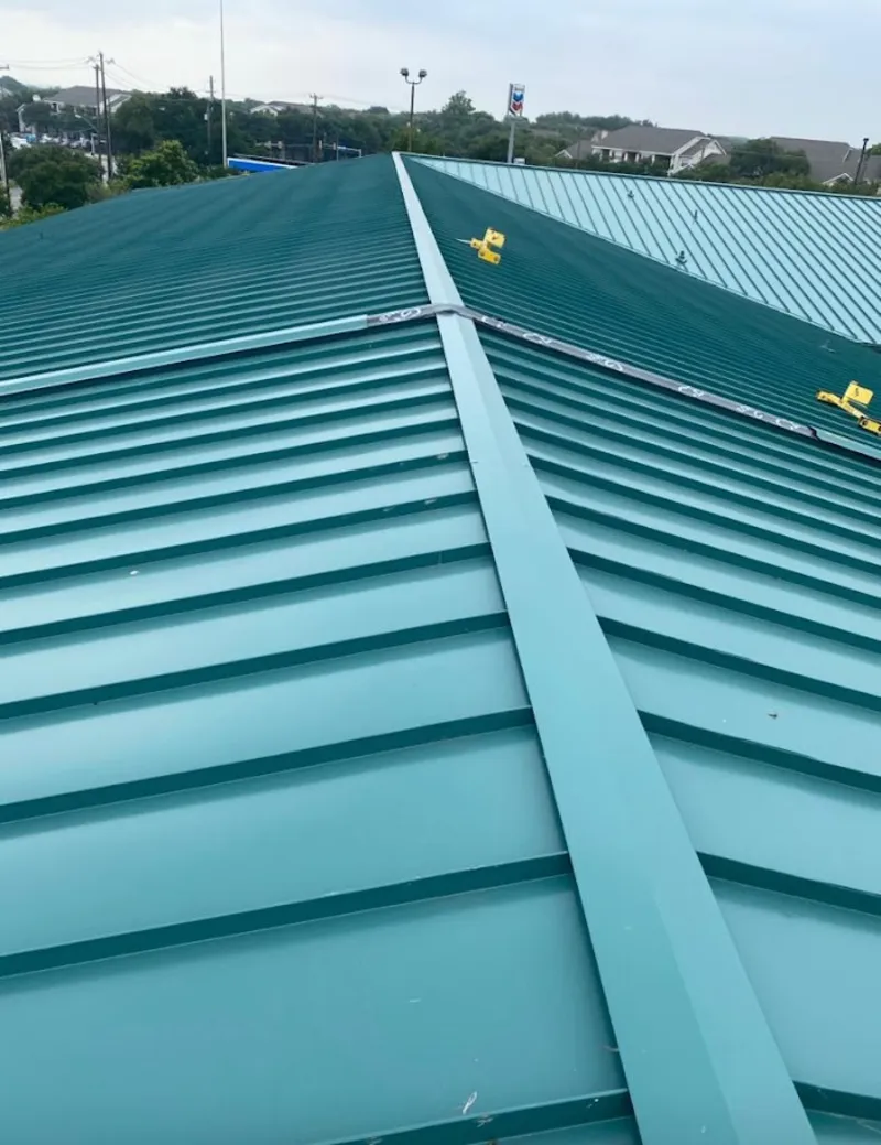 Green commercial metal roof ridge and valley for Metal Roof Repair in Hollywood